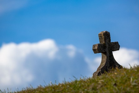 Photo: Gravestone in shape of a cross